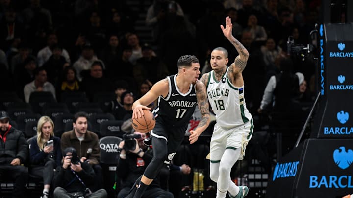 Dec 14, 2025; Brooklyn, New York, USA; Brooklyn Nets forward Michael Porter Jr. (17) looks to shoot the ball as Milwaukee Bucks forward Kyle Kuzma (18) defends during the first half at Barclays Center. Mandatory Credit: John Jones-Imagn Images Dec 14, 2025; Brooklyn, New York, USA; Brooklyn Nets forward Michael Porter Jr. (17) looks to shoot the ball as Milwaukee Bucks forward Kyle Kuzma (18) defends during the first half at Barclays Center. Mandatory Credit: John Jones-Imagn Images