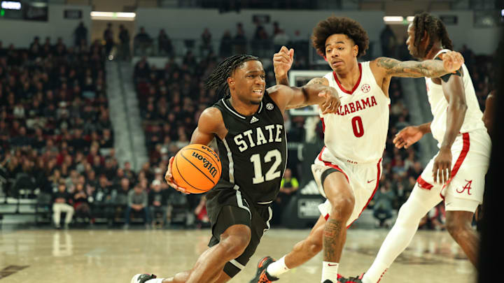 Jan 29, 2025; Starkville, Mississippi, USA; Mississippi State Bulldogs guard Josh Hubbard (12) drives to the basket against Alabama Crimson Tide guard Labaron Philon (0) during the second half at Humphrey Coliseum. Mandatory Credit: Wesley Hale-Imagn Images Jan 29, 2025; Starkville, Mississippi, USA; Mississippi State Bulldogs guard Josh Hubbard (12) drives to the basket against Alabama Crimson Tide guard Labaron Philon (0) during the second half at Humphrey Coliseum. Mandatory Credit: Wesley Hale-Imagn Images