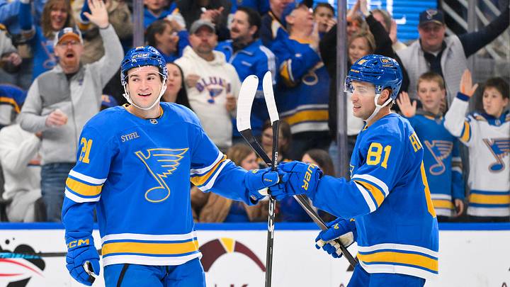 Mar 28, 2026; St. Louis, Missouri, USA; St. Louis Blues right wing Jimmy Snuggerud (21) is congratulated by left wing Dylan Holloway (81) after scoring against the Toronto Maple Leafs during the second period at Enterprise Center. Mandatory Credit: Jeff Curry-Imagn Images Mar 28, 2026; St. Louis, Missouri, USA; St. Louis Blues right wing Jimmy Snuggerud (21) is congratulated by left wing Dylan Holloway (81) after scoring against the Toronto Maple Leafs during the second period at Enterprise Center. Mandatory Credit: Jeff Curry-Imagn Images
