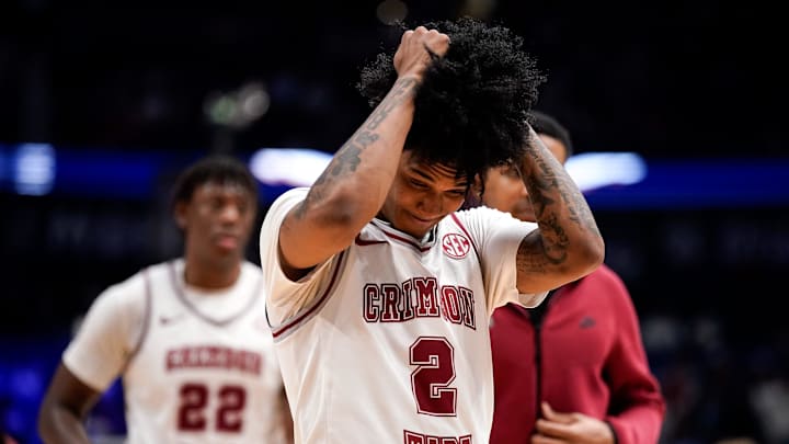 Alabama guard Aden Holloway (2) reacts after Mississippi won a SEC tournament quarterfinal game at Bridgestone Arena in Nashville, Tenn., Friday, March 13, 2026.