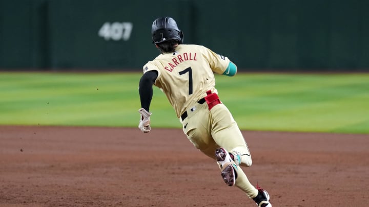 Arizona Diamondbacks outfielder Corbin Carroll (7) runs the bases en route to an RBI triple against the Los Angeles Angels during the second inning at Chase Field on June 11.