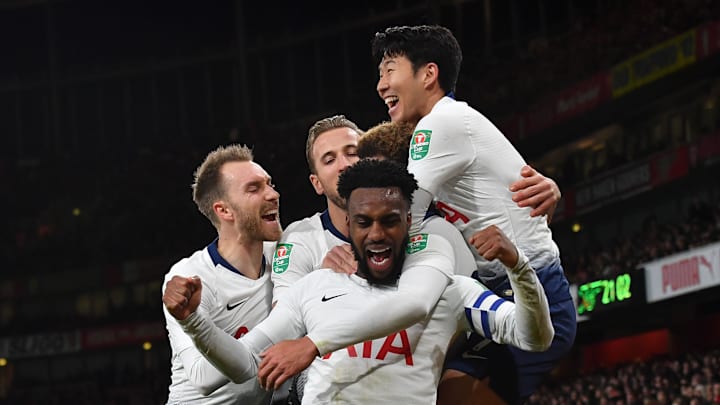 Spurs players celebrate against Arsenal