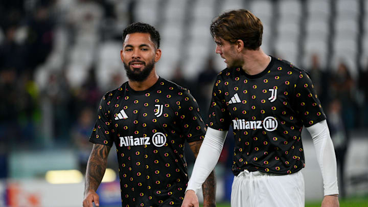 Juventus outcasts Douglas Luiz (left) and Dusan Vlahovic could be heading to Newcastle United 