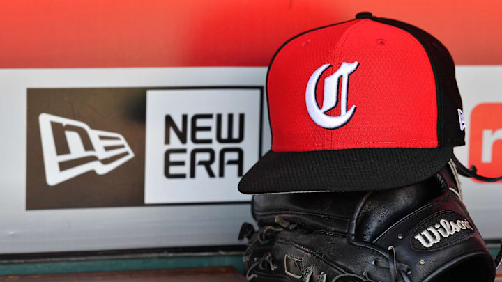Cincinnati Reds hat and glove