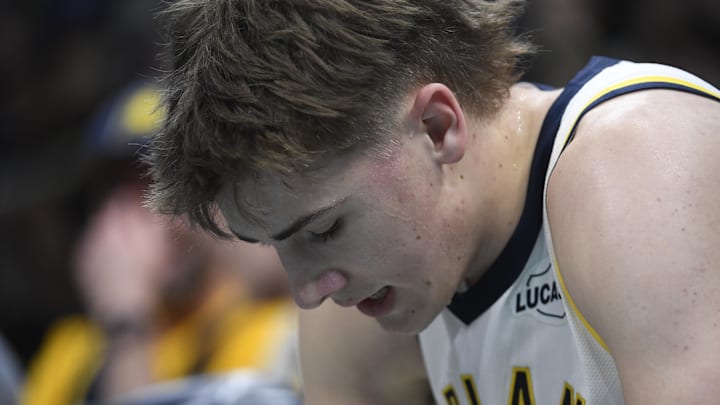 Indiana Pacers guard Johnny Furphy (12) in a timeout during the second half against the Charlotte Hornets at the Spectrum Center.
