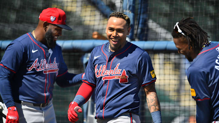 Atlanta Braves players, from left, Marcell Ozuna, Orlando Arcia and Ronald Acuna, Jr. joke around