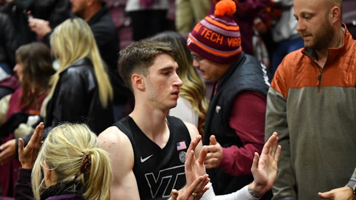 Jan 27, 2026; Blacksburg, Virginia, USA;  Virginia Tech Hokies guard Neoklis Avdalas (17) is congratulated by fans after the game against the Georgia Tech Yellow Jackets at Cassell Coliseum. Mandatory Credit: Brian Bishop-Imagn Images