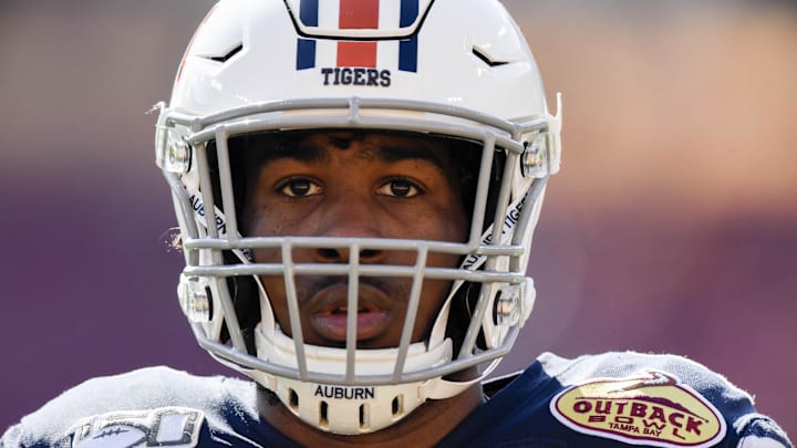 Jan 1, 2020; Tampa, Florida, USA; Auburn Tigers running back Kam Martin (9) warms up prior to the game between the Auburn Tigers and the Minnesota Golden Gophers at Raymond James Stadium. Mandatory Credit: Douglas DeFelice-Imagn Images Jan 1, 2020; Tampa, Florida, USA; Auburn Tigers running back Kam Martin (9) warms up prior to the game between the Auburn Tigers and the Minnesota Golden Gophers at Raymond James Stadium. Mandatory Credit: Douglas DeFelice-Imagn Images