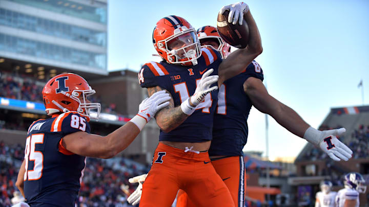 Nov 25, 2023; Champaign, Illinois, USA; Illinois Fighting Illini wide receiver Casey Washington (14)