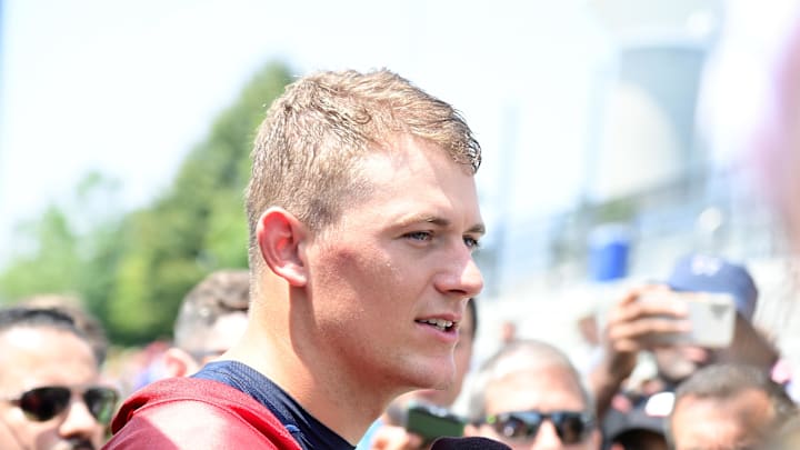 Jul 26, 2023; Foxborough, MA, USA; New England Patriots quarterback Mac Jones (10) speaks to the