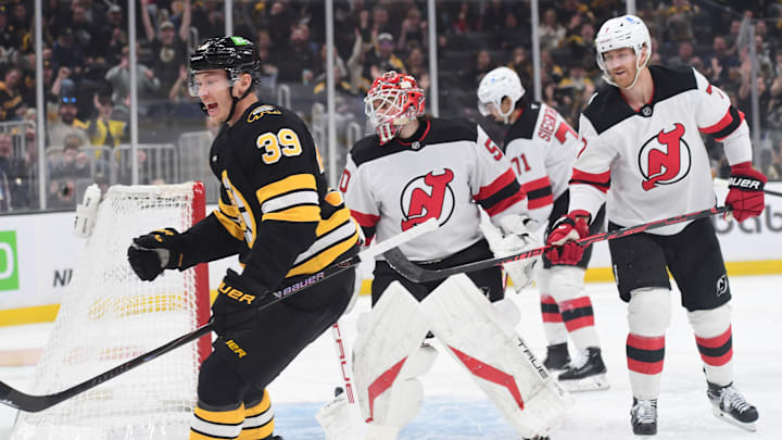 Apr 14, 2026; Boston, Massachusetts, USA; Boston Bruins center Morgan Geekie (39) reacts after scoring a goal past New Jersey Devils goalie Nico Daws (50) during the first period at TD Garden. Mandatory Credit: Bob DeChiara-Imagn Images