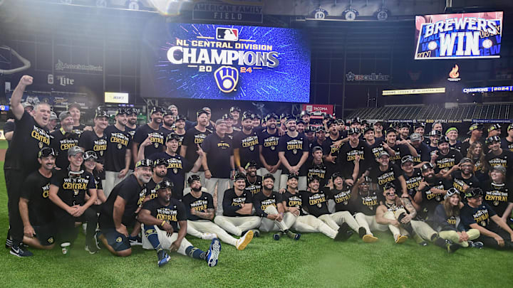 Sep 18, 2024; Milwaukee, Wisconsin, USA; Milwaukee Brewers pose for a team photo after beating the Philadelphia Phillies and winning the NL Central Division at American Family Field. Mandatory Credit: Benny Sieu-Imagn Images
