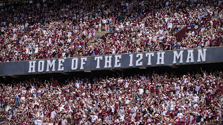 Sep 18, 2021; College Station, Texas, USA; A view of the fans and students and the 12th man logo sign during the game between the Texas A&M Aggies and the New Mexico Lobos at Kyle Field. Mandatory Credit: Jerome Miron-Imagn Images