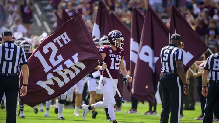 Sep 18, 2021; College Station, Texas, USA; Texas A&M Aggies safety Connor Choate (12) carries the 12th Man flag on to the field before the game against the New Mexico Lobos. Mandatory Credit: Jerome Miron-Imagn Images Sep 18, 2021; College Station, Texas, USA; Texas A&M Aggies safety Connor Choate (12) carries the 12th Man flag on to the field before the game against the New Mexico Lobos. Mandatory Credit: Jerome Miron-Imagn Images