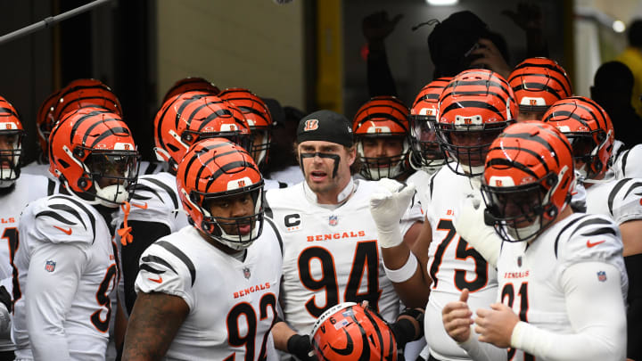 Dec 23, 2023; Pittsburgh, Pennsylvania, USA; Cincinnati Bengals defensive end Sam Hubbard (94) gets ready to put on his helmet as they prepare to play the Pittsburgh Steelers at Acrisure Stadium. Mandatory Credit: Philip G. Pavely-USA TODAY Sports Dec 23, 2023; Pittsburgh, Pennsylvania, USA; Cincinnati Bengals defensive end Sam Hubbard (94) gets ready to put on his helmet as they prepare to play the Pittsburgh Steelers at Acrisure Stadium. Mandatory Credit: Philip G. Pavely-USA TODAY Sports