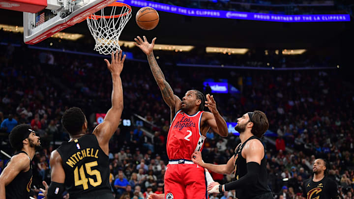 Los Angeles Clippers forward Kawhi Leonard (2) shoots against Cleveland Cavaliers guard Donovan Mitchell (45) during the second half at Intuit Dome. Mandatory Credit: Gary A. Vasquez-Imagn Images Los Angeles Clippers forward Kawhi Leonard (2) shoots against Cleveland Cavaliers guard Donovan Mitchell (45) during the second half at Intuit Dome. Mandatory Credit: Gary A. Vasquez-Imagn Images