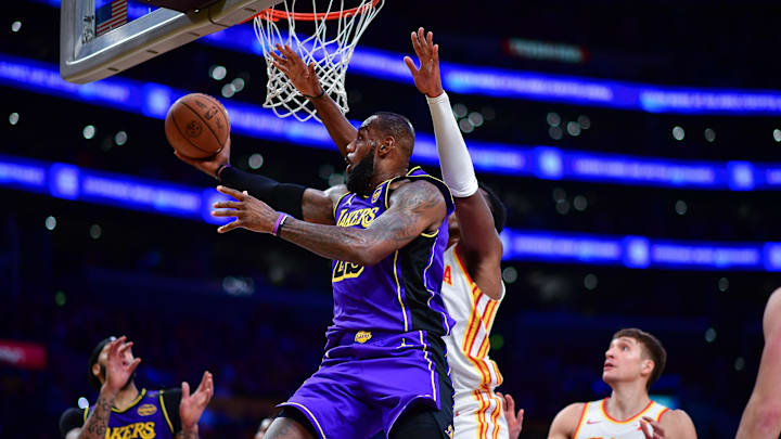 Jan 3, 2025; Los Angeles, California, USA; Los Angeles Lakers forward LeBron James (23) moves to the basket to score against the Atlanta Hawks during the second half at Crypto.com Arena. Mandatory Credit: Gary A. Vasquez-Imagn Images