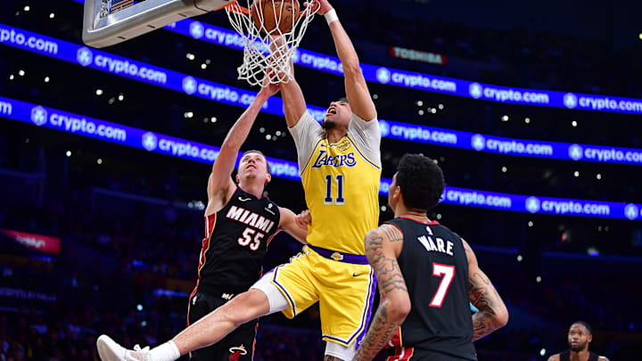 January 15, 2025; Los Angeles, California, USA; Los Angeles Lakers center Jaxson Hayes (11) shoots ahead of Miami Heat forward Duncan Robinson (55) during the second half at Crypto.com Arena. Mandatory Credit: Gary A. Vasquez-Imagn Images