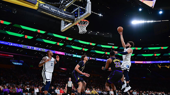 Nov 14, 2023; Los Angeles, California, USA; Memphis Grizzlies forward David Roddy (21) shoots against Los Angeles Lakers forward Rui Hachimura (28) and center Jaxson Hayes (11) during the second half at Crypto.com Arena. Mandatory Credit: Gary A. Vasquez-Imagn Images Nov 14, 2023; Los Angeles, California, USA; Memphis Grizzlies forward David Roddy (21) shoots against Los Angeles Lakers forward Rui Hachimura (28) and center Jaxson Hayes (11) during the second half at Crypto.com Arena. Mandatory Credit: Gary A. Vasquez-Imagn Images