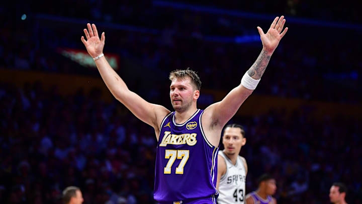 Nov 5, 2025; Los Angeles, California, USA; Los Angeles Lakers guard Luka Doncic (77) reacts after scoring a basket against the San Antonio Spurs during the first half at Crypto.com Arena. Mandatory Credit: Gary A. Vasquez-Imagn Images