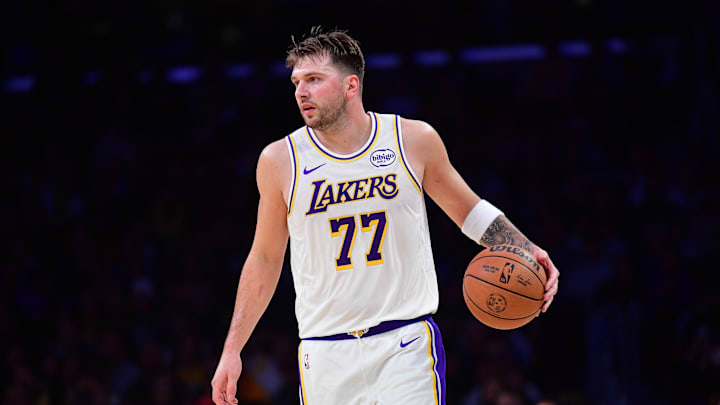 Nov 30, 2025; Los Angeles, California, USA; Los Angeles Lakers guard Luka Doncic (77) controls the ball against the New Orleans Pelicans during the first half at Crypto.com Arena. Mandatory Credit: Gary A. Vasquez-Imagn Images Nov 30, 2025; Los Angeles, California, USA; Los Angeles Lakers guard Luka Doncic (77) controls the ball against the New Orleans Pelicans during the first half at Crypto.com Arena. Mandatory Credit: Gary A. Vasquez-Imagn Images