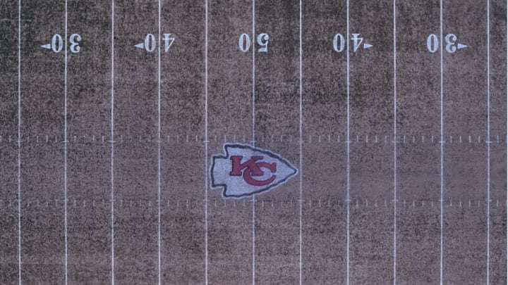 Feb 14, 2024; Kansas City, MO, USA; The Kansas City Chiefs logo at midfield at Arrowhead Stadium at the Truman Sports Complex. Mandatory Credit: Kirby Lee-Imagn Images