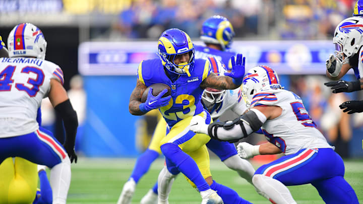 Dec 8, 2024; Inglewood, California, USA; Los Angeles Rams running back Kyren Williams (23) runs the ball against Buffalo Bills linebacker Matt Milano (58) 
