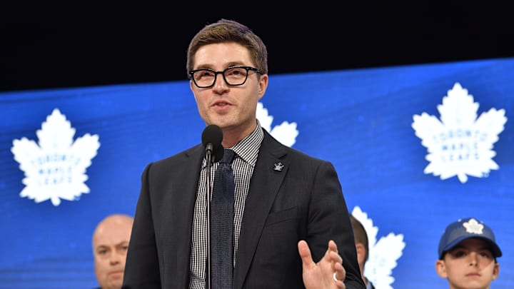 Jun 22, 2018; Dallas, TX, USA; Toronto Maple Leafs general manager Kyle Dubas announces the number twenty-nine overall pick in the first round of the 2018 NHL Draft at American Airlines Center. Mandatory Credit: Jerome Miron-Imagn Images