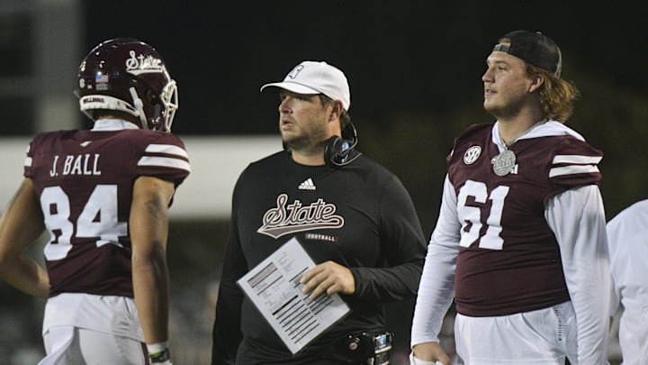 Mississippi State Bulldogs head coach Jeff Lebby speaks with players during the fourth quarter against the Massachusetts Minutemen at Davis Wade Stadium at Scott Field.