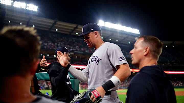 New York Yankees right fielder Aaron Judge (99) is greeted following the seventh inning against the Los Angeles Angels at Angel Stadium on May 27. New York Yankees right fielder Aaron Judge (99) is greeted following the seventh inning against the Los Angeles Angels at Angel Stadium on May 27.