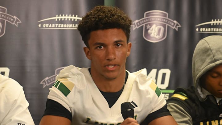 Lincoln quarterback Taylor Jacobs Jr. speaks at 4Quartersonline Media Day at Hangar 38 in Tallahassee, Florida, Tuesday, July 22, 2025. Lincoln quarterback Taylor Jacobs Jr. speaks at 4Quartersonline Media Day at Hangar 38 in Tallahassee, Florida, Tuesday, July 22, 2025.