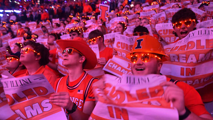 Dec 10, 2024; Champaign, Illinois, USA; Illinois fighting Illini fans before a game with the Wisconsin Badgers at State Farm Center. Mandatory Credit: Ron Johnson-Imagn Images Dec 10, 2024; Champaign, Illinois, USA; Illinois fighting Illini fans before a game with the Wisconsin Badgers at State Farm Center. Mandatory Credit: Ron Johnson-Imagn Images