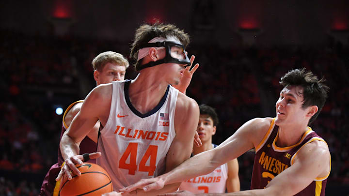 Jan 17, 2026; Champaign, Illinois, USA;  Illinois Fighting Illini forward Zvonimir Ivisic (44) pulls a rebound away from Minnesota Golden Gophers forward Bobby Durkin (3) during the first half at State Farm Center. Mandatory Credit: Ron Johnson-Imagn Images