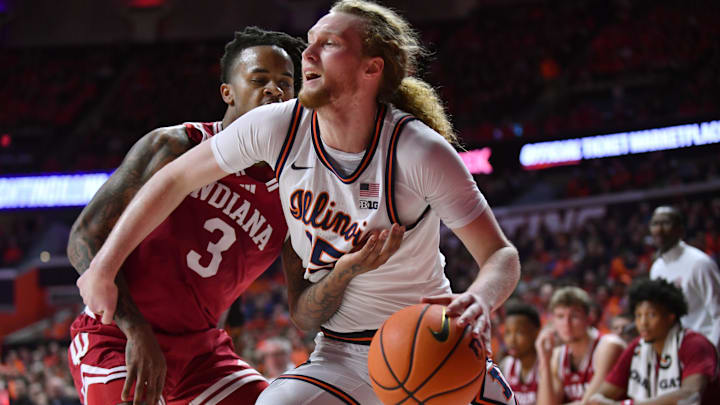 Feb 15, 2026; Champaign, Illinois, USA;  Illinois Fighting Illini forward Jake Davis (15) drives past Indiana Hoosiers guard Lamar Wilkerson (3) during the first half at State Farm Center. Mandatory Credit: Ron Johnson-Imagn Images