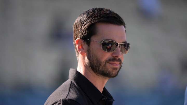Jul 6, 2019; Los Angeles, CA, USA; Los Angeles Dodgers assistant general manager Brandon Gomes reacts before the game against the San Diego Padres at Dodger Stadium. The Padres defeated the Dodgers 3-1. Mandatory Credit: Kirby Lee-USA TODAY Sports