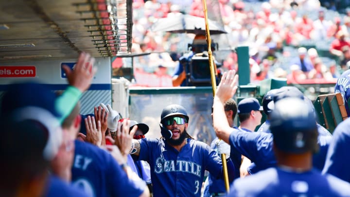 Seattle Mariners shortstop J.P. Crawford (3) celebrates his solo home run against the Los Angeles Angels during the sixth inning at Angel Stadium on July 14. Seattle Mariners shortstop J.P. Crawford (3) celebrates his solo home run against the Los Angeles Angels during the sixth inning at Angel Stadium on July 14.