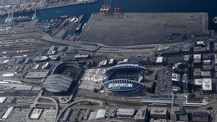 T-Mobile Park (left) and CenturyLink Field are pictured in an aerial over view on April 29, 2019, in Seattle.