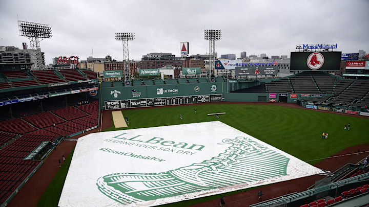 A view of the tarp on the field prior to a game between the Boston Red Sox and Minnesota Twins at Fenway Park in Boston on Sept. 21, 2024.