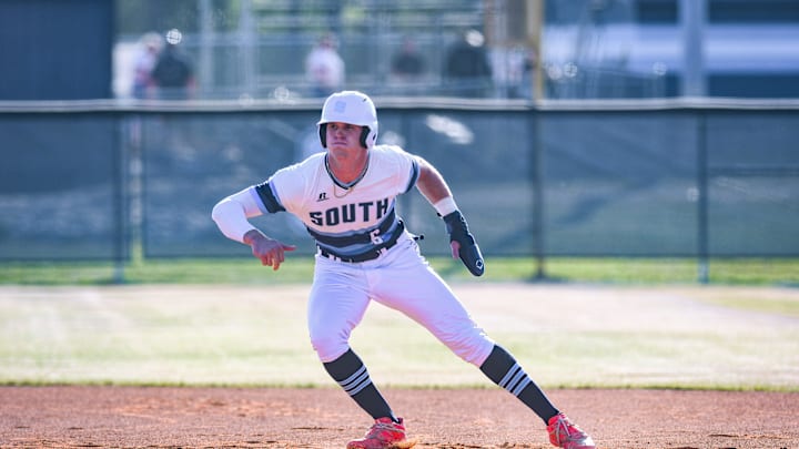 South Brunswick's Walker Jenkins navigates the bases as the Cougars hosted Carrboro in the second round of the NCHSAA 3A state playoffs.