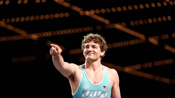 Olympian Ben Askren points to the crowd as he enters the mat to face fellow Olympian and New Jersey native Jordan Burroughs (not pictured) during the Beat the Streets \"Grapple at the Garden\" on Monday, May 6, 2019, in New York.

Grapple At The Garden