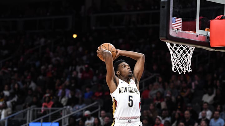 New Orleans Pelicans forward Herb Jones (5) dunks against the New Orleans Pelicans in the second quarter at State Farm Arena. 