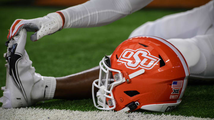 Dec 4, 2021; Arlington, TX, USA; A view of an Oklahoma State Cowboys helmet and logo as the Cowboys