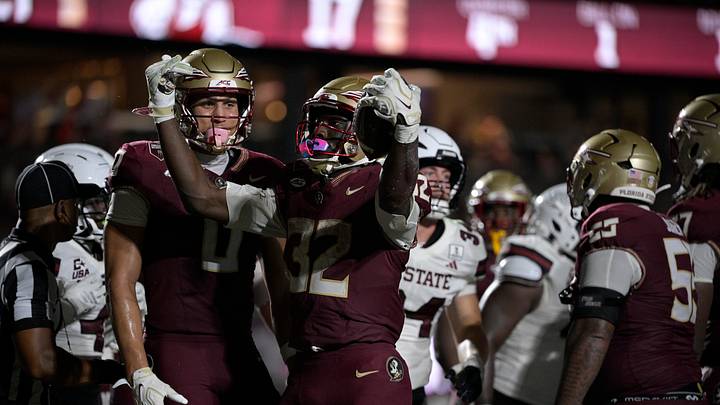 Aug 29, 2026; Tallahassee, Florida, USA;  Florida State running back Ousmane Kromah (32) celebrates a touchdown with wide receiver Duce Robinson (0) during the fourth quarter against New Mexico State at Doak S. Campbell Stadium.  Mandatory Credit: Melina Myers-Imagn Images