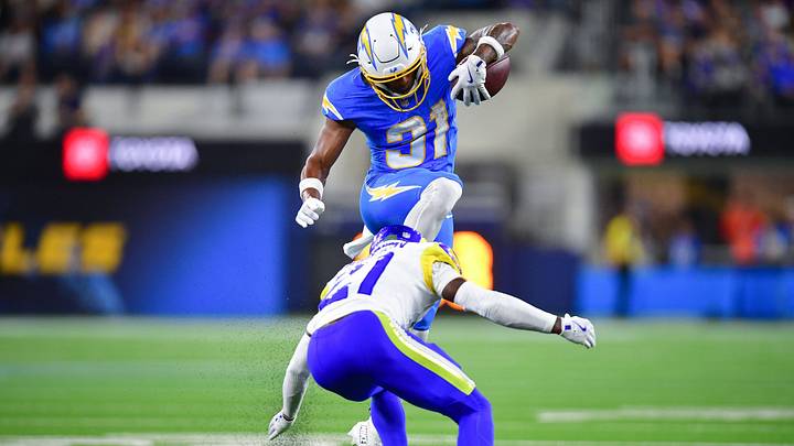 Aug 27, 2026; Inglewood, California, USA; Los Angeles Chargers running back Greg Desrosiers Jr. (31) leaps over Los Angeles Rams cornerback Cam Lampkin (21) during the second half at SoFi Stadium. Mandatory Credit: Gary A. Vasquez-Imagn Images Aug 27, 2026; Inglewood, California, USA; Los Angeles Chargers running back Greg Desrosiers Jr. (31) leaps over Los Angeles Rams cornerback Cam Lampkin (21) during the second half at SoFi Stadium. Mandatory Credit: Gary A. Vasquez-Imagn Images