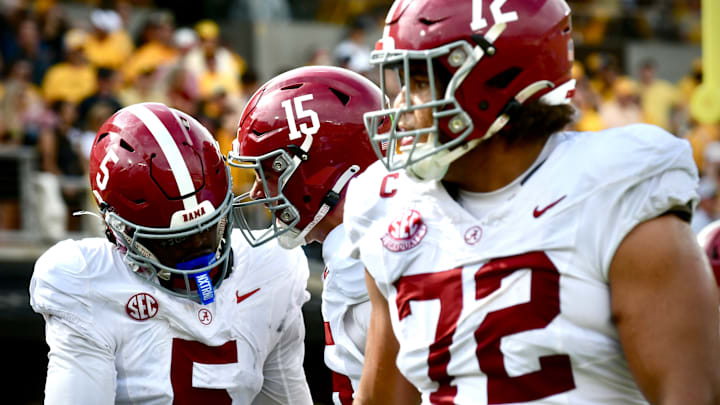 Oct 11, 2025; Columbia, MO, USA; Alabama Crimson Tide quarterback Ty Simpson (15) hypes up receiver Germie Bernard (5) in the fourth quarter against the Missouri Tigers at Faurot Field at Memorial Stadium.