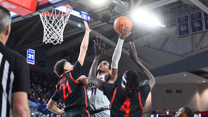 Miles Byrd (21) defends Nolan Hickman (11) during Gonzaga's home game vs. San Diego State
