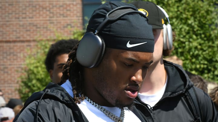 Sep 6, 2025; Columbia, Missouri, USA; Missouri Tigers defensive tackle Chris McClellan walks outside of Faurot Field at Memorial Stadium ahead of the renewed Border Showdown between the Tigers and Kansas Jayhawks.