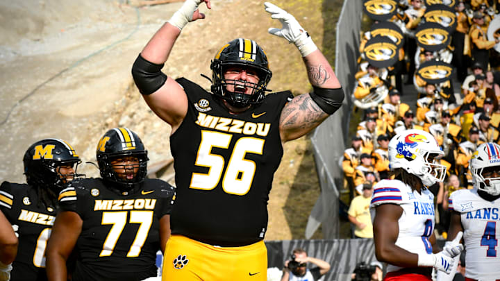 Sep 6. 2025; Columbia, Missouri, USA; Missouri Tigers offensive lineman Dominick Giudice (56) celebrates a touchdown in the second half of the Border War against the Kansas Jayhawks at Faurot Field at Memorial Stadium.