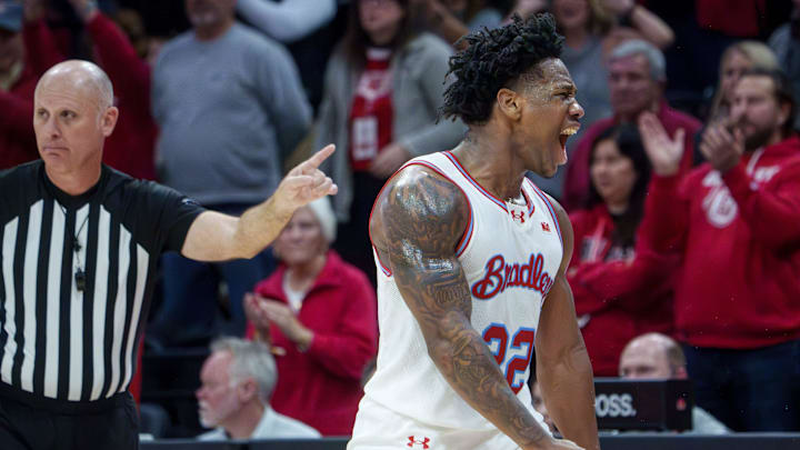 Bradley's Jaquan Johnson celebrates a Belmont turnover late in the overtime period of their college basketball game Monday, Feb. 9, 2026 at Carver Arena in Peoria. The Braves defeated the Bruins 95-84. Bradley's Jaquan Johnson celebrates a Belmont turnover late in the overtime period of their college basketball game Monday, Feb. 9, 2026 at Carver Arena in Peoria. The Braves defeated the Bruins 95-84.
