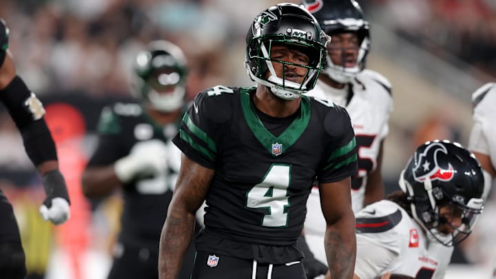 Oct 31, 2024; East Rutherford, New Jersey, USA; New York Jets cornerback D.J. Reed (4) reacts after sacking Houston Texans quarterback C.J. Stroud (7) during the first quarter at MetLife Stadium. Mandatory Credit: Brad Penner-Imagn Images Oct 31, 2024; East Rutherford, New Jersey, USA; New York Jets cornerback D.J. Reed (4) reacts after sacking Houston Texans quarterback C.J. Stroud (7) during the first quarter at MetLife Stadium. Mandatory Credit: Brad Penner-Imagn Images
